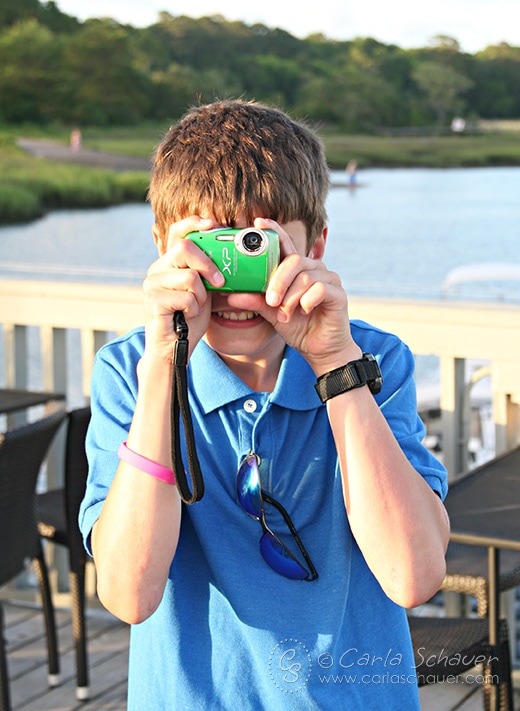 Tweens love to take photos, and are at a great age to have their own cameras. Great tween travel tips at Meander & Coast